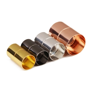 Macro view of cylindrical magnetic jewelry clasps in gold silver rose gold and gun black