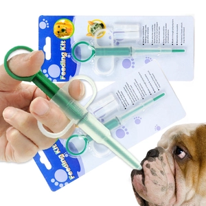 Kit per l'alimentazione degli animali con siringa verde e punte in silicone