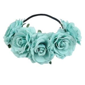 Detail of bohemian teal artificial rose headband for festivals and vacations