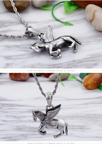 Detailed close-up of a vintage silver Pegasus pendant with intricate feather texture