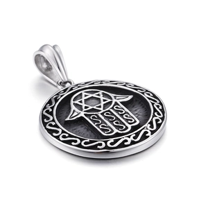 Vintage silver Hand of Fatima and Star of David round pendant necklace on white background