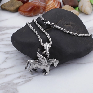 Silver stainless steel flying horse pegasus pendant necklace on a dark stone base