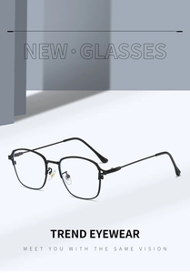 Detail view of black polygonal metal frame glasses on a modern geometric background