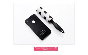Mini portable lint roller compared with a smartphone to show its compact travel size