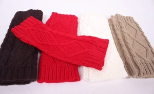 Flat lay of cable knit leg warmers in four colors including red and beige