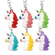 Set of six colorful silicone unicorn keychains with rainbow horns and metal rings