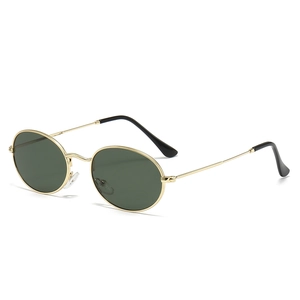 Vintage oval sunglasses with slim gold metal frames and classic dark green lenses