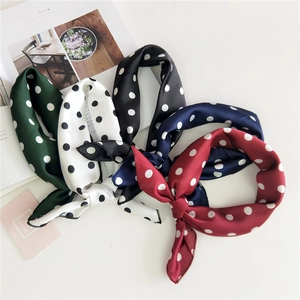 Polka dot silk neck scarves set in five colors on a white minimalist background