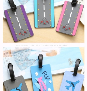 Macro view of colorful 3D PVC airplane luggage tags with durable buckle straps