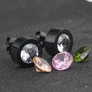 Macro shot of black stainless steel stud earrings with white and multi-color cubic zirconia