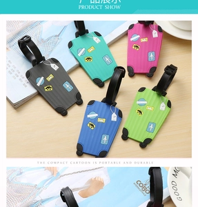 Close-up of five colorful silicone luggage tags in mini suitcase shapes with adjustable straps