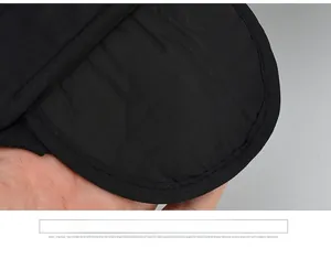 Detail of black winter hat earflaps with premium windproof fabric and reinforced stitching