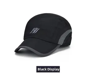 Detail view of the black sports baseball cap showing grey embroidery and side panel textures