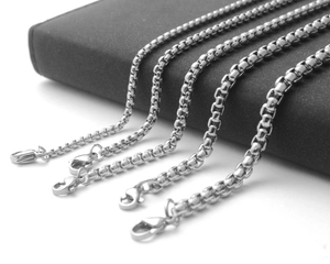 Detailed macro view of silver stainless steel box chains in five various thicknesses