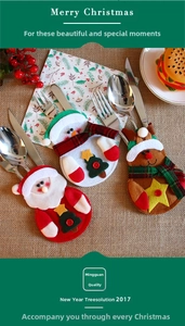 Close-up of Santa, snowman and reindeer felt cutlery holders for Christmas table decor