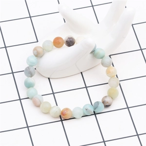 Handcrafted 8mm amazonite stone bead bracelet displayed on a ceramic hand model