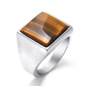 Macro shot of silver stainless steel men's signet ring with square tiger eye stone inlay