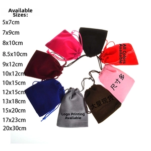 Various sizes and colors of velvet drawstring pouches for jewelry gift packaging