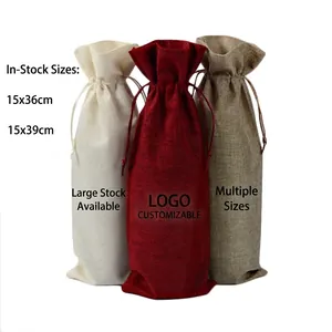 Three linen drawstring wine bags in cream, burgundy, and natural colors 15x39cm