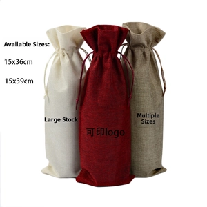 Three linen drawstring wine bags in cream, burgundy, and natural colors 15x39cm