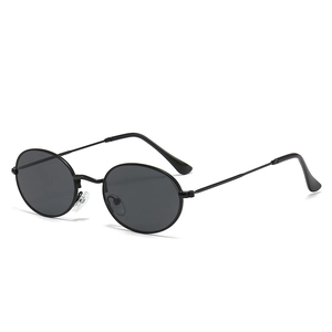 Retro round metal frame sunglasses with black thin temples and dark grey polarized lenses