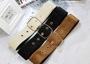 Three wide suede belts in beige, black and brown with vintage gold square buckles