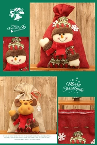 Detail of Christmas burlap gift bag with plush reindeer and snowman character 3D decorations