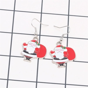 Detail of Santa Claus acrylic earrings with sunglasses on a checkered background