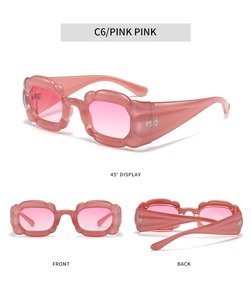 Detailed views of pink Y2K pumpkin sunglasses with thick wavy frames and gradient lenses