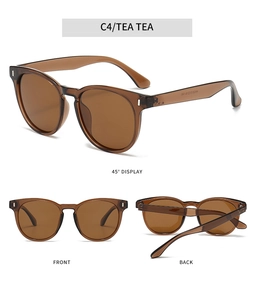 Detail view of oval polarized sunglasses with brown frames and silver hinge rivets
