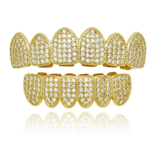 Detailed view of 18K gold plated hip hop grillz set with sparkling white micro-pave gems