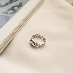 Macro shot of S925 silver adjustable chain ring with grey rectangular zircon stone