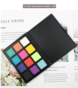 Macro view of 12-color eyeshadow palette with vibrant matte and shimmer pressed powders