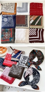 Detail view of cotton paisley square scarves with vintage prints and stitched edges