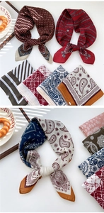 Close-up of vintage paisley square scarves with premium texture in French chic style
