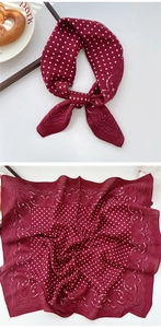 Detail of burgundy paisley scarf with white polka dots, showing draped and flat views