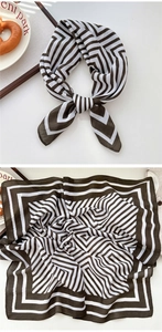 Detail of square silk scarf with brown geometric stripe pattern and elegant satin texture
