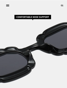 Close-up of comfortable nose support on Y2K pumpkin shaped sunglasses with black frame