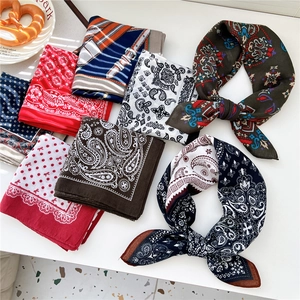 Collection of paisley and floral silk squares in vintage colors for hair or neck styling