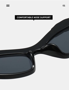 Detail view of the integrated comfortable nose support on black rectangular sunglasses