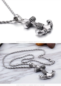 Macro detail of vintage anchor pendant in titanium steel with twisted rope texture