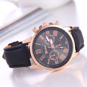 Detail of rose gold case and black leather strap on a men's business quartz watch