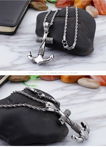Detailed macro view of vintage anchor pendant necklace in antique finish stainless steel
