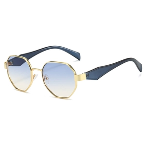 Polygonal gold metal sunglasses featuring trendy blue-to-yellow gradient lenses for women