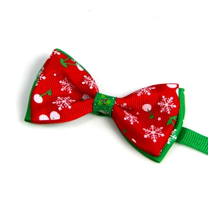 Christmas pet bowtie with red and green snowflake patterns for dogs and cats