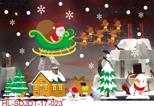 Detailed view of Christmas window stickers featuring Santa, reindeer, and snowy trees