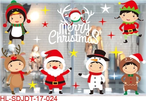 Close-up of Merry Christmas window static stickers featuring cartoon Santa and snowman motifs