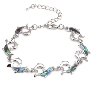 Silver dolphin bracelet featuring colorful abalone shell inlay and adjustable link chain