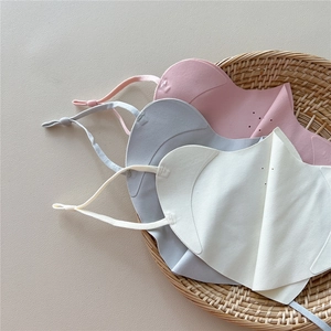 Breathable sun mask in pink, grey and beige with adjustable ear straps and nose vents