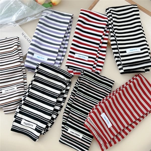 Multiple colorful striped sun protection arm sleeves with stylish knitted patterns